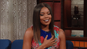 Gabrielle Union purses her lips and sighs deeply before cringing and shaking her head on The Late Show with Stephen Colbert