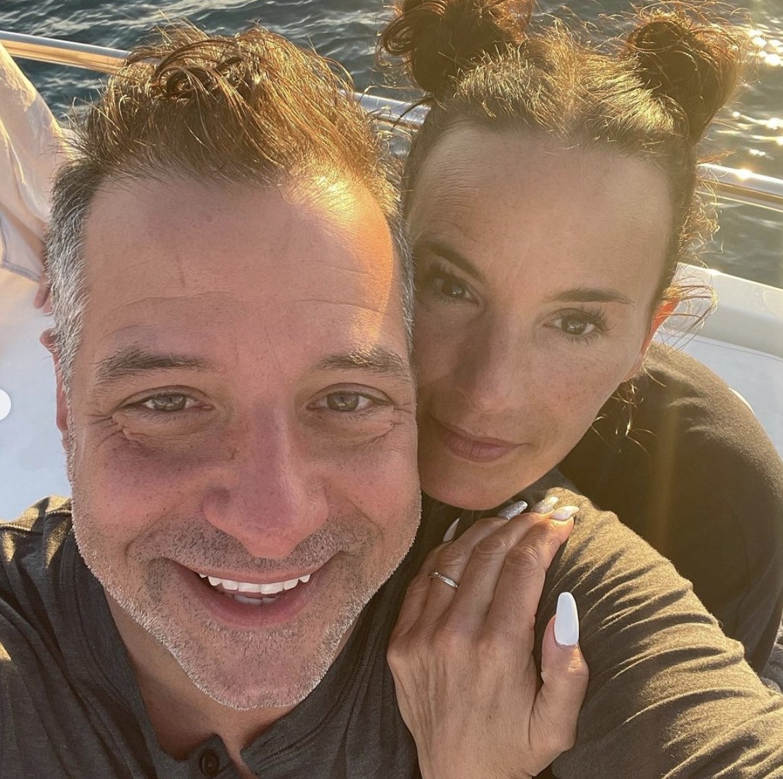 Marc takes a selfie on a boat with Heidi