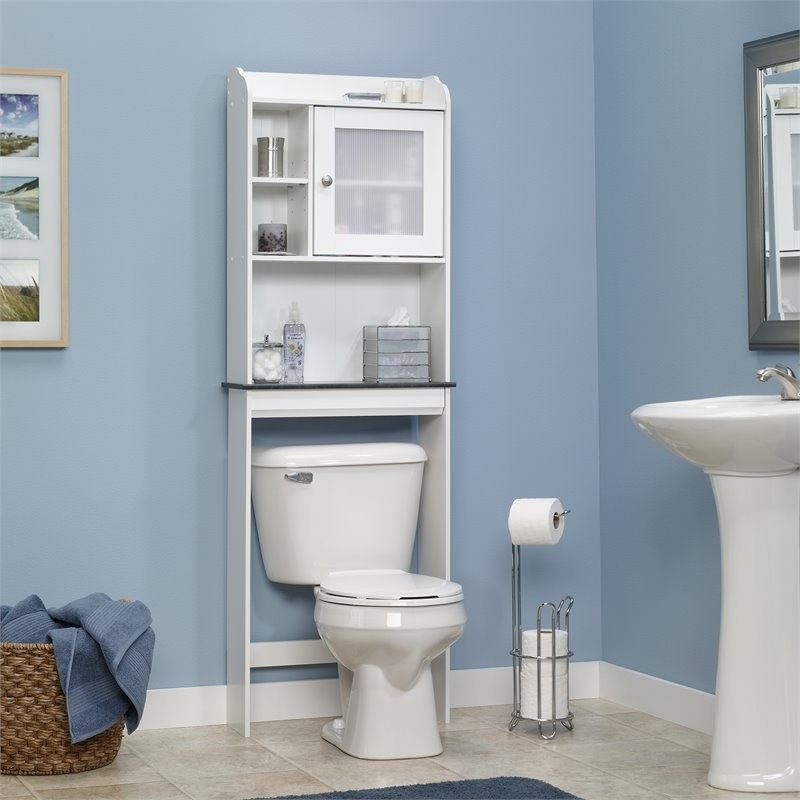 The bathroom organizer with an open shelf and additional storage, directly above a toilet in a bathroom