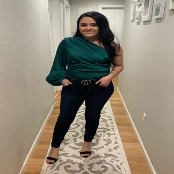 a different reviewer wearing the blouse in teal