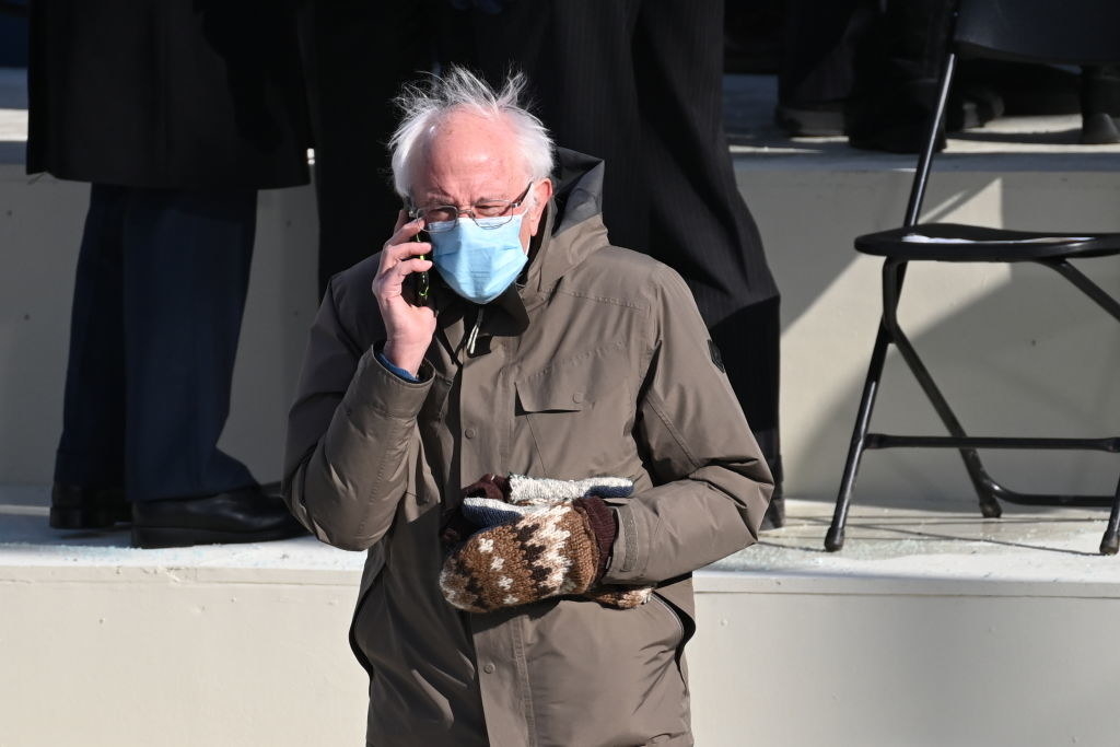 Bernie Sanders speaking on his cellphone at the inauguration