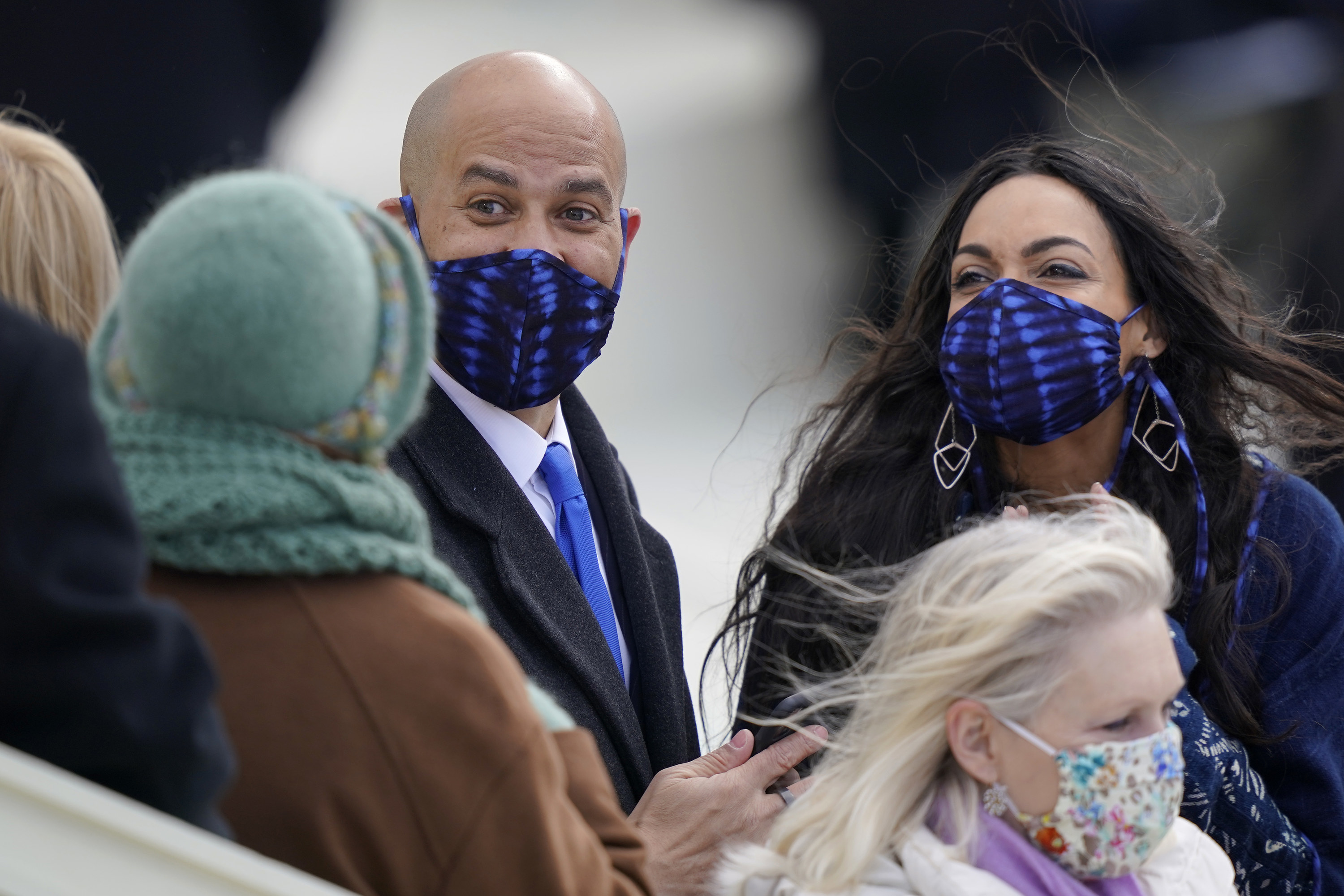 Sen. Cory Booker and Rosario Dawson in indigo-dyed face masks at the inauguration. 