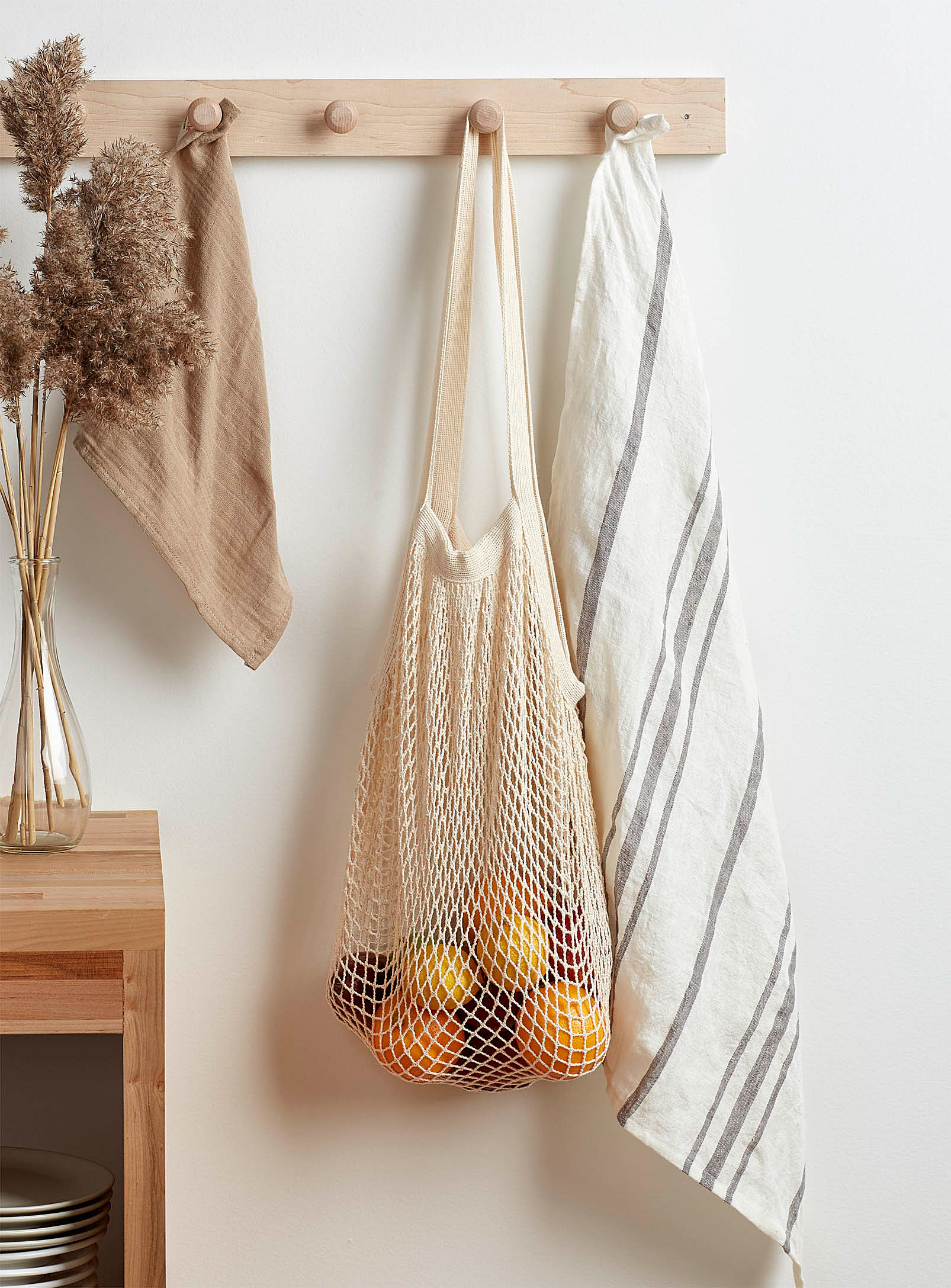 mesh bag hanging with fruit in it