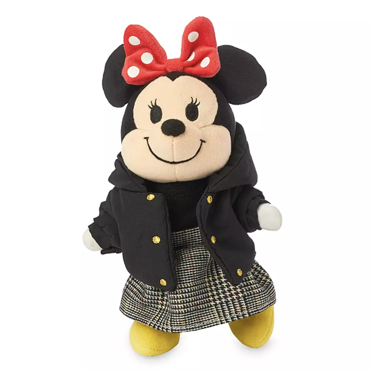 a plush of minnie in a winter coat and plaid skirt