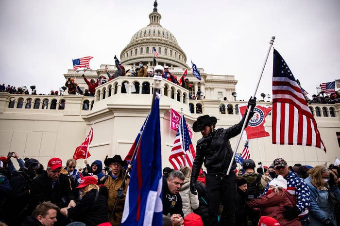 Trump-supporting insurrectionists breaching the Capitol