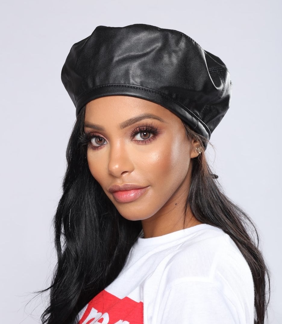 a model wears the Segal Leather Beret
