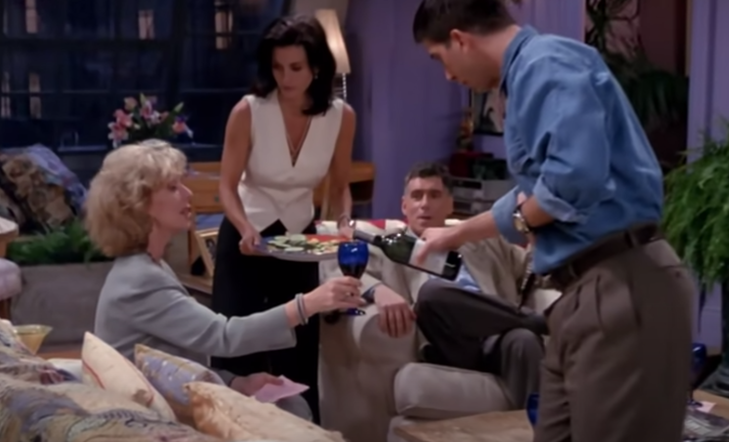 Monica and Ross serving their parents food and wine in &quot;Friends&quot;