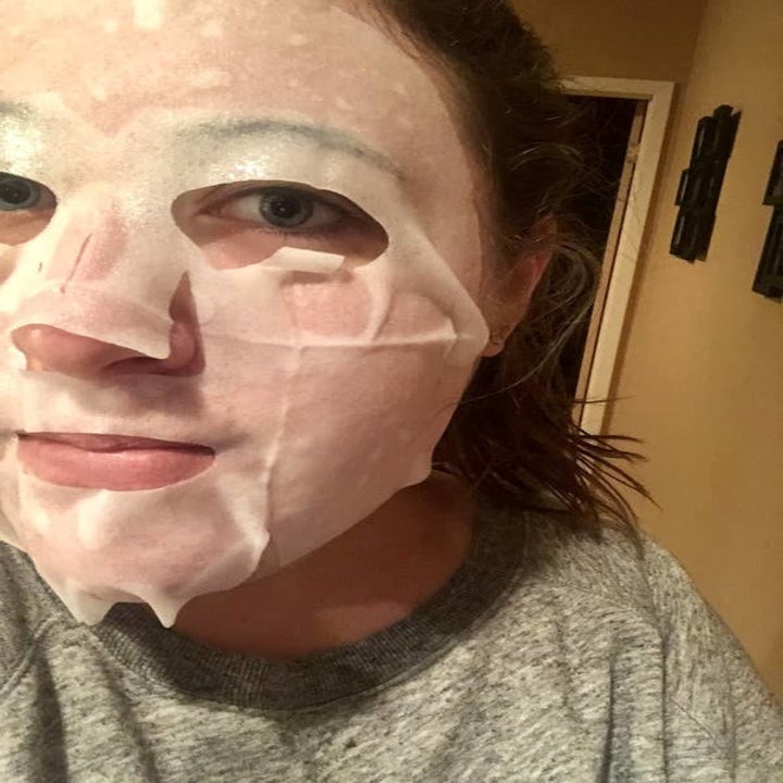 Samantha wearing the sheet mask