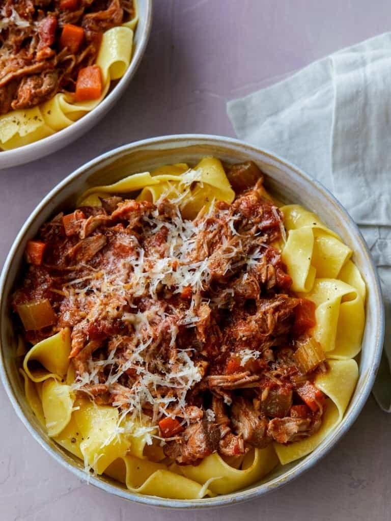 Pappardelle noodles topped with pork ragu. 