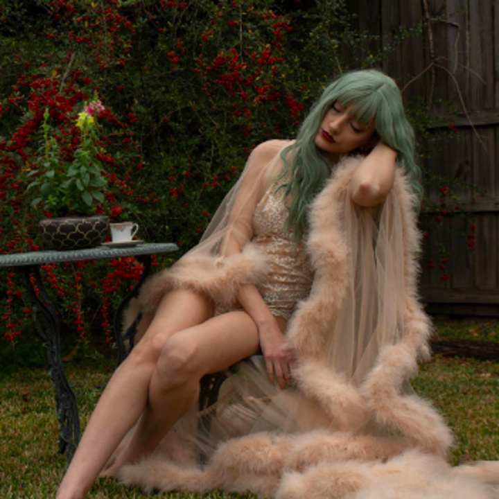 Reviewer wearing the robe with lingerie outside