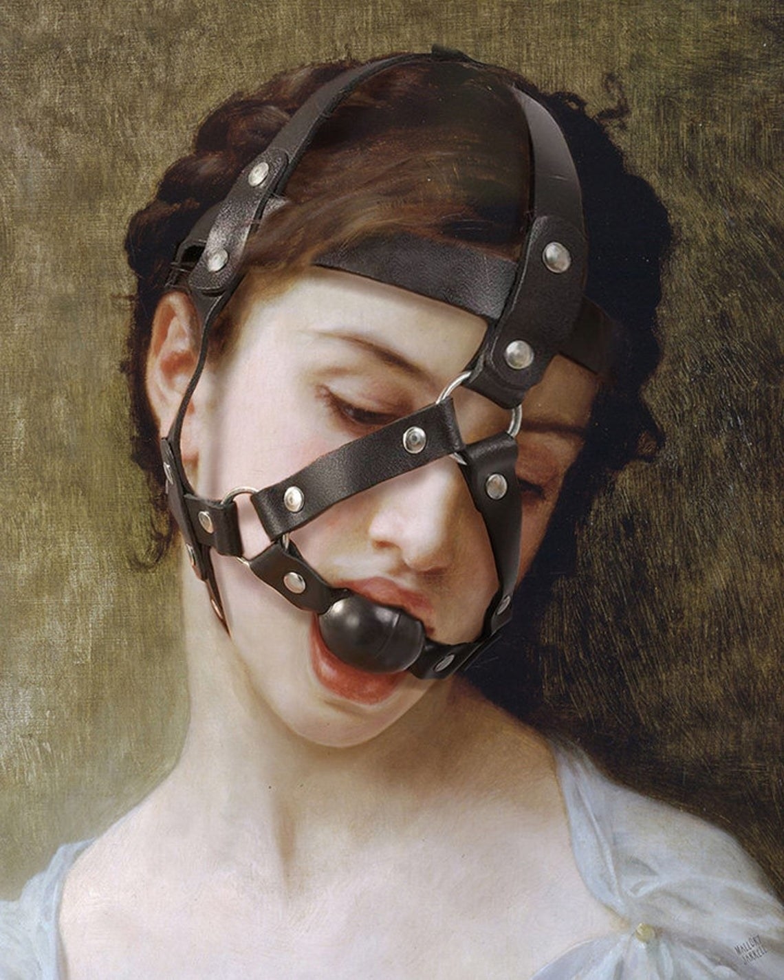 Classical style portrait of woman with added leather and metal face harness and ball gag