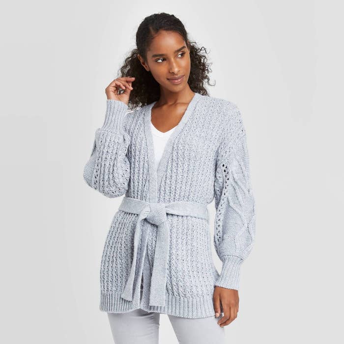 moden in open cardigan