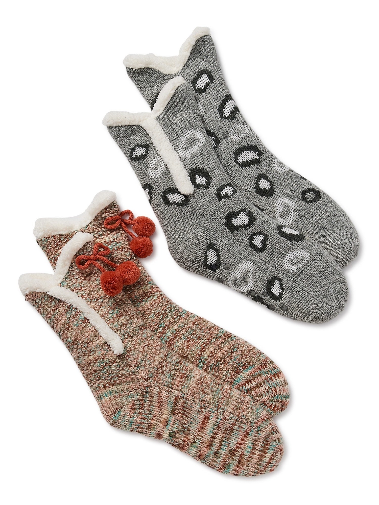 Two pairs of the cozy socks with a plush lining in a multi-colored print and a black and grey leopard print