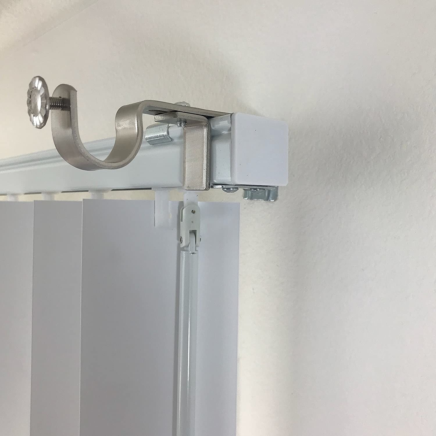 The NoNo Brackets attached to a set of vertical blinds