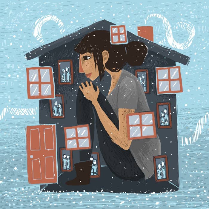 An illustration of a 30-something woman sitting in her home as it snows outside