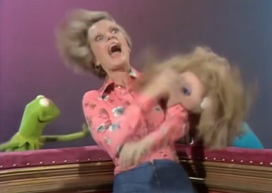 Miss Piggy Attacks Florence Henderson as Kermit watches