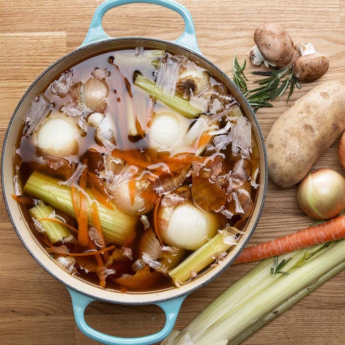 A pot of veggie stock made with kitchen scraps