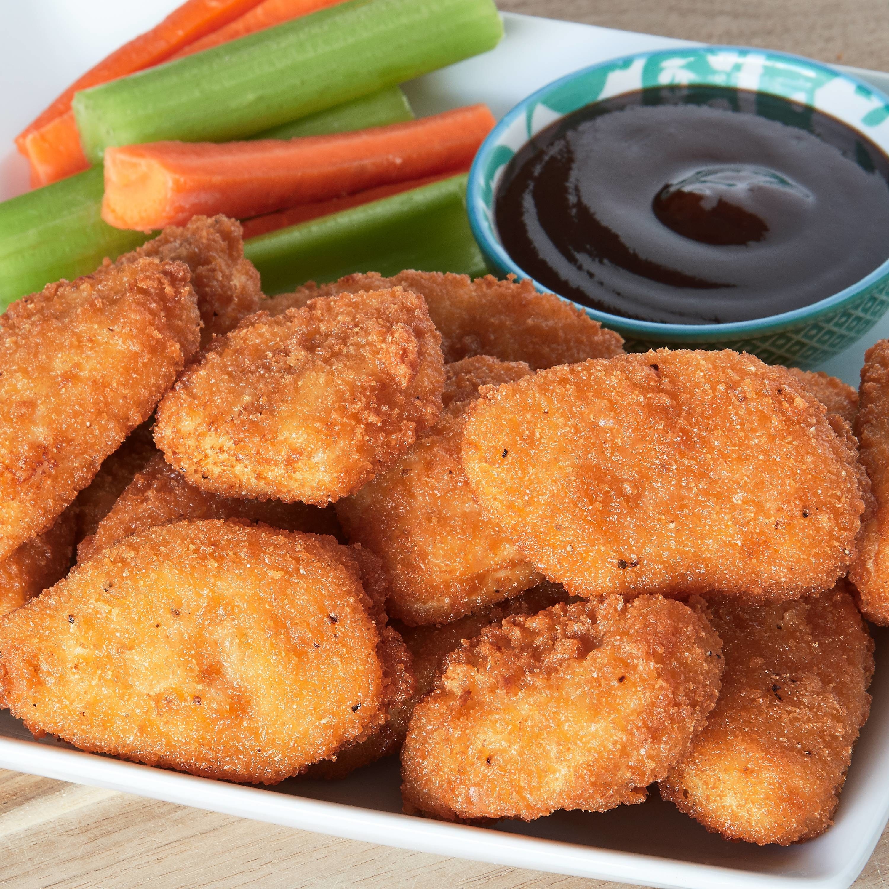 Close-up of chicken nuggets cooked and styled on a plate