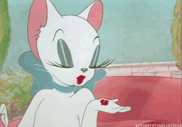 A cat from Tom and Jerry blowing a kiss 
