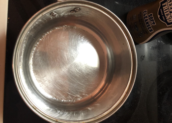 the same pot now completely clean of the black burnt bits