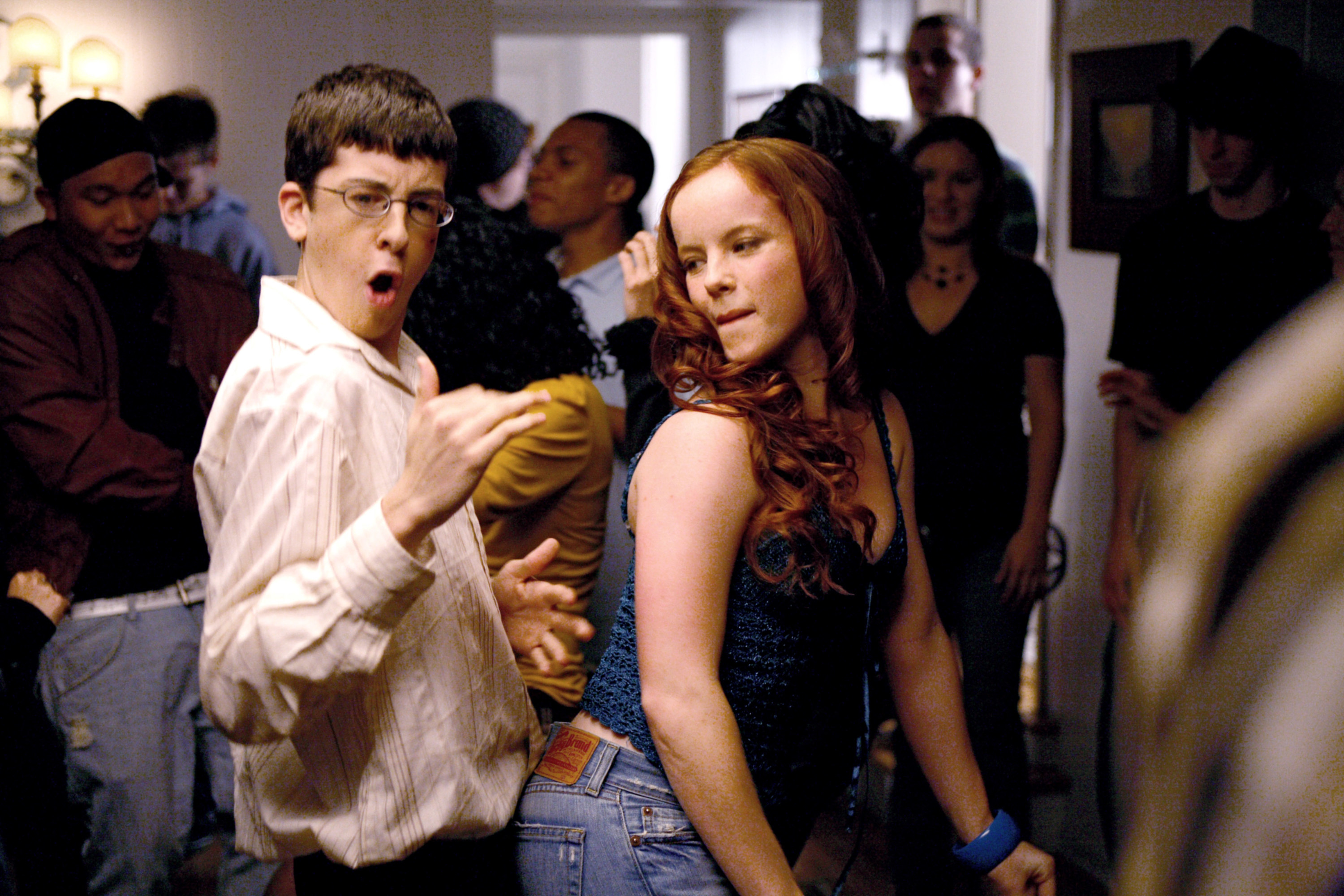 Christopher Mintz-Plasse and Aviva Baumann dancing together in "Superbad"