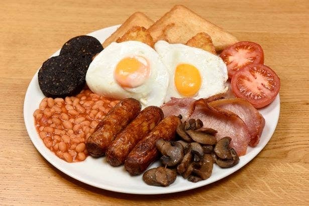 A full English with toast, egg, tomato, bacon, mushroom, sausage, beans and black pudding.