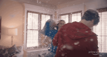 Kathryn Newton and Kyle Allen engage in a pillow fight. 