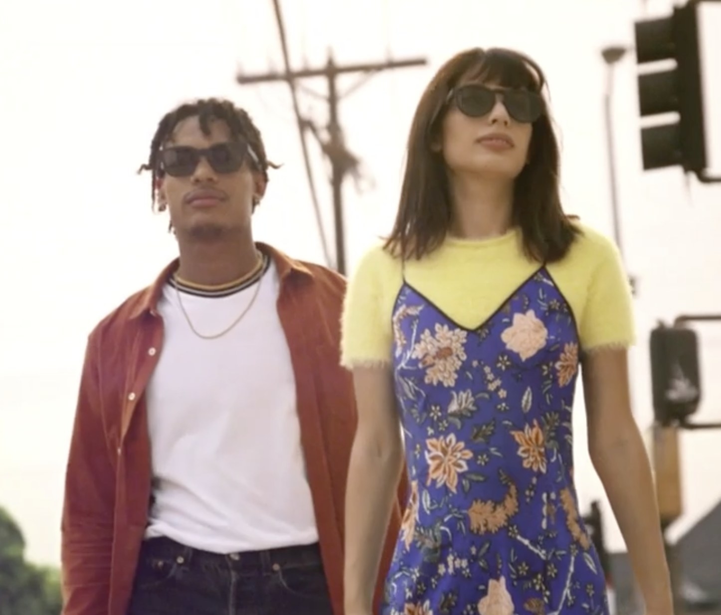 Two models wearing sunglasses