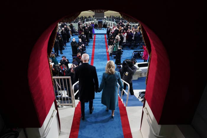 Joe and Jill Biden entering the Inauguration through a doorway