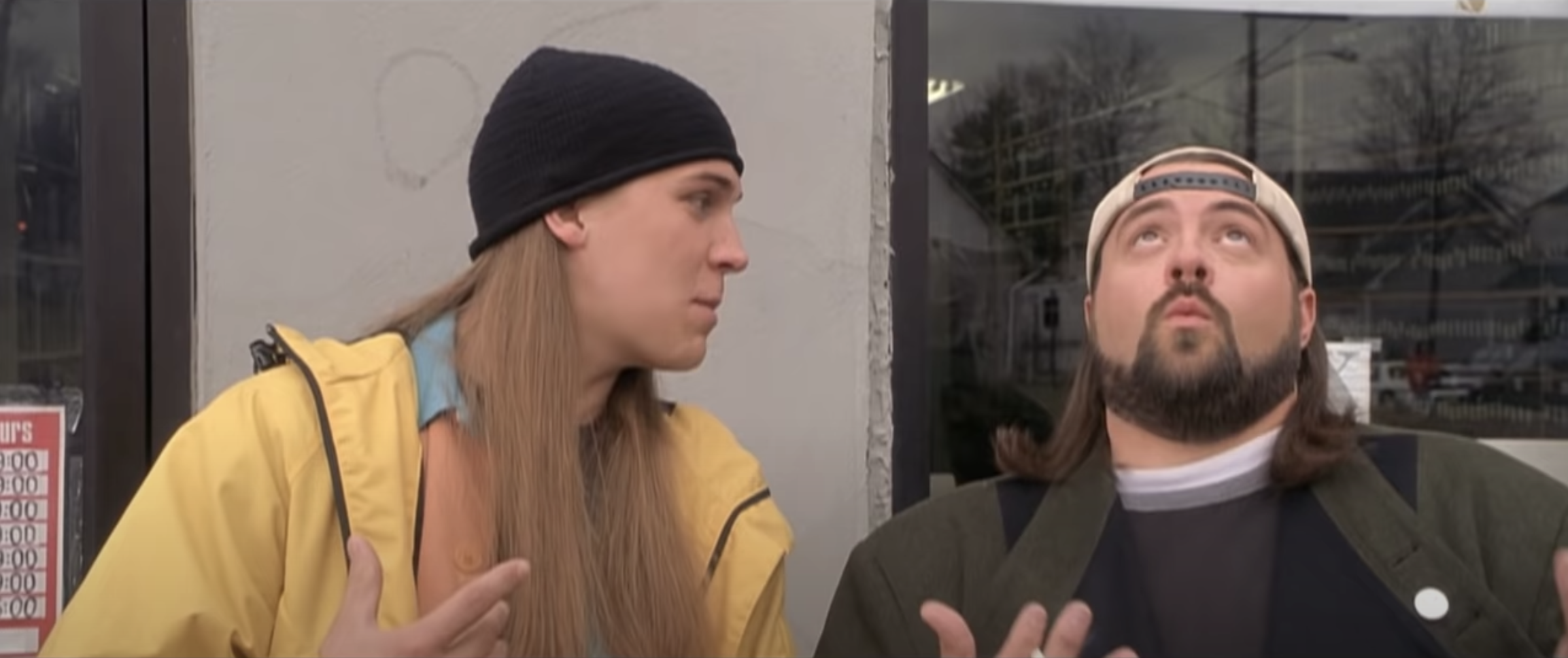 Jay and Silent Bob dancing outside a store