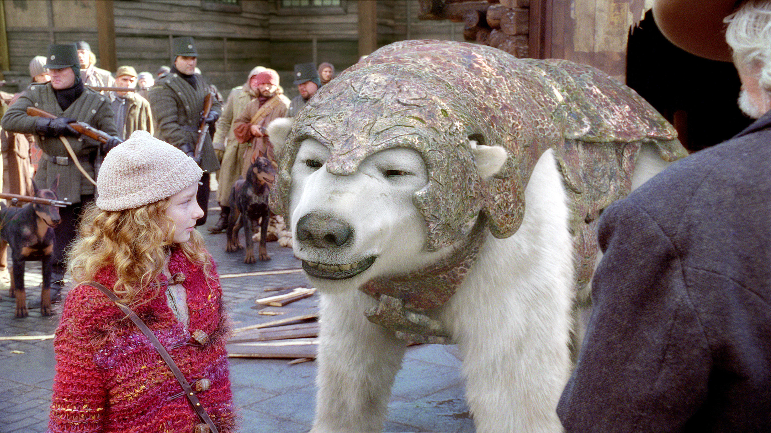 Lyra and Iorek Byrnison - the armored bear - in the film