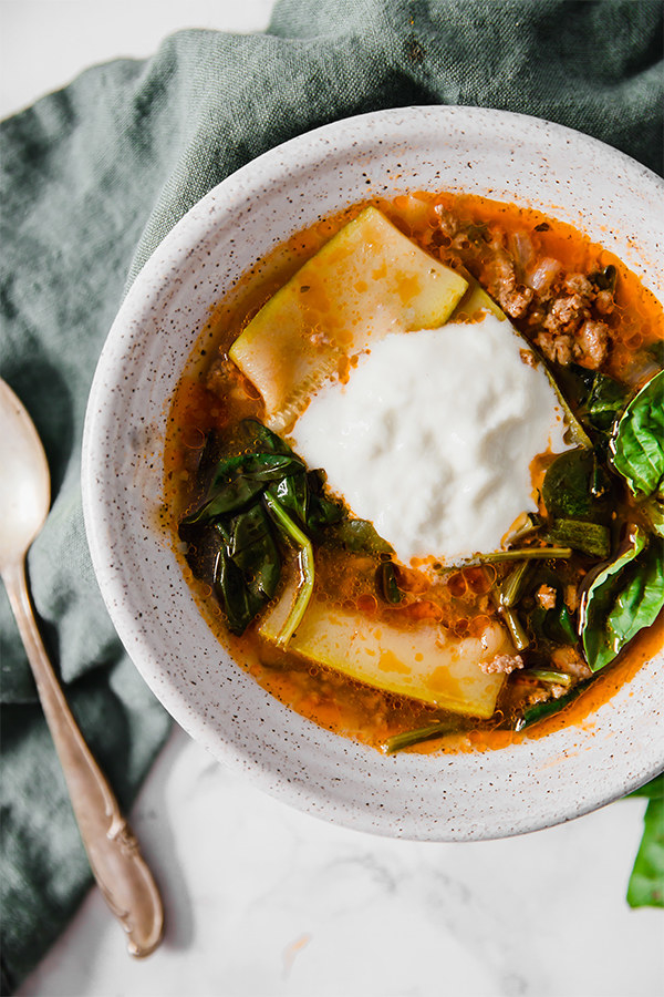 Lasagna soup with zucchini and ricotta.