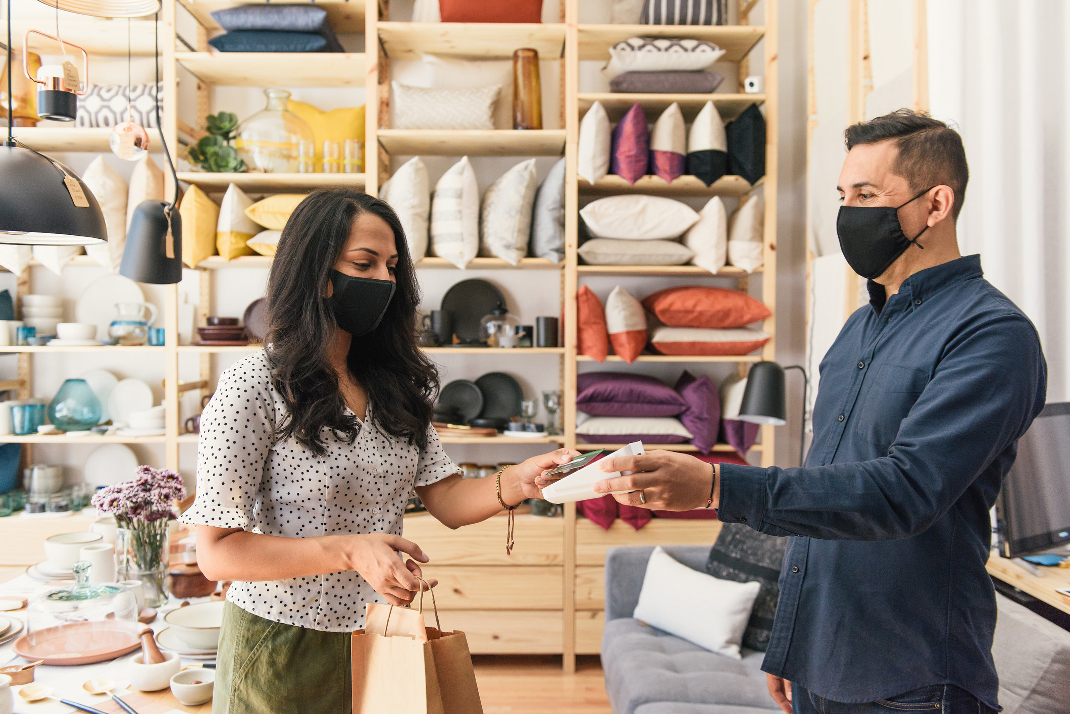 a person buying something at a home goods store