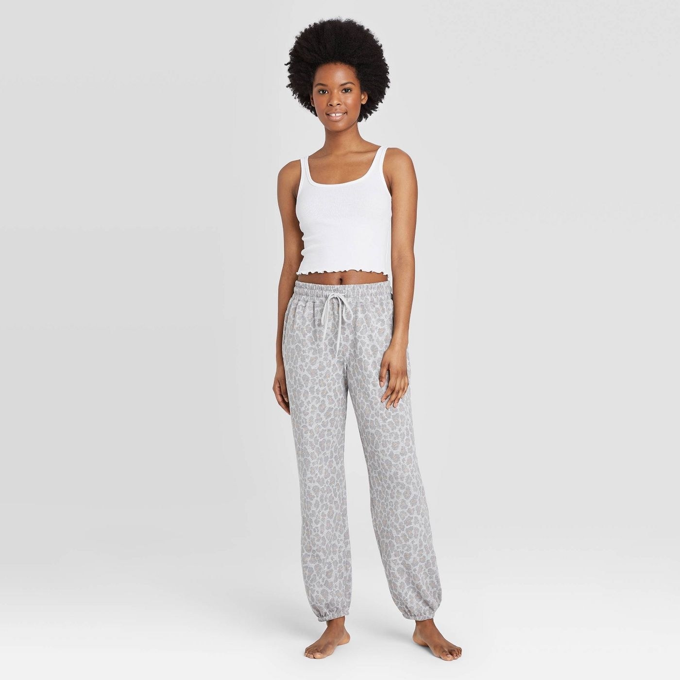 Model in french terry leopard joggers