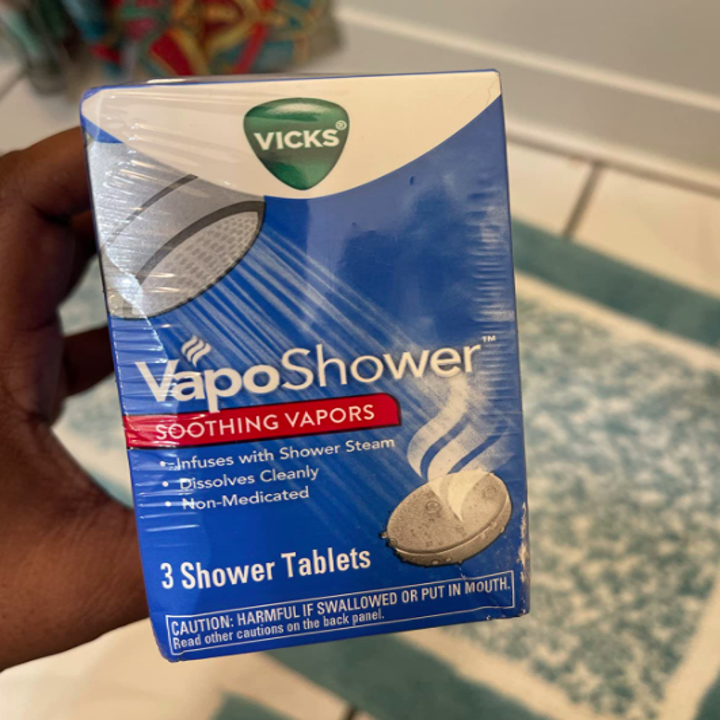 A customer review photo of the box of VapoShower tablets