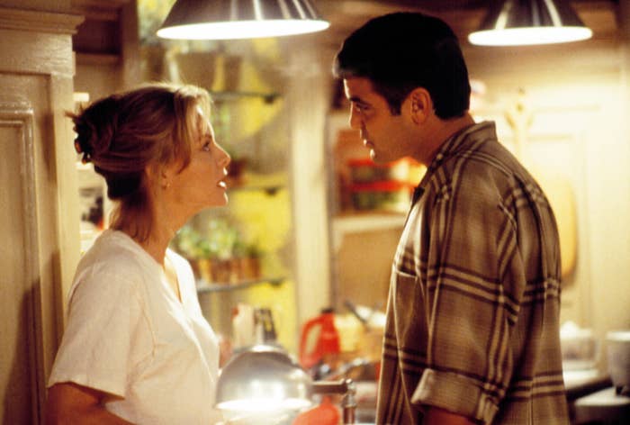 Michelle Pfeiffer and George Clooney having a discussion in One Fine Day