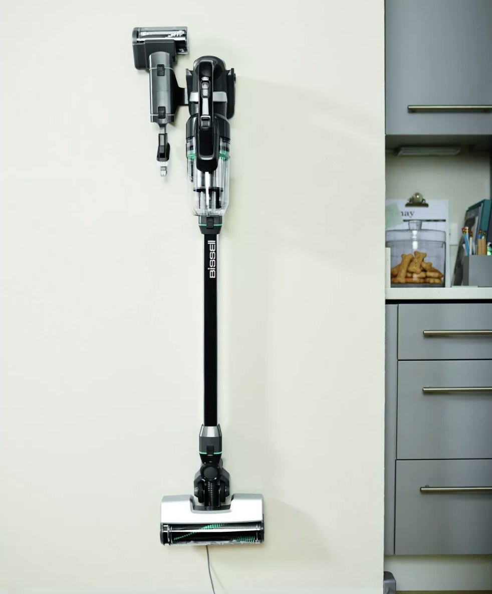 A vacuum mounted on the wall