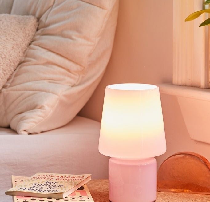 The lavender lamp which has a glass shade