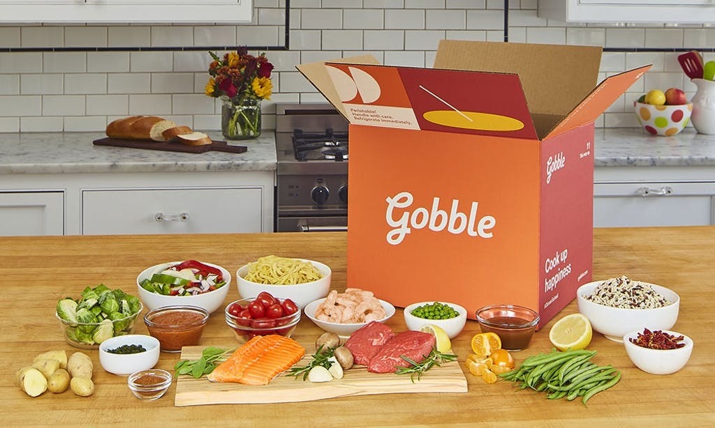 A sample box with ingredients like protein and vegetables