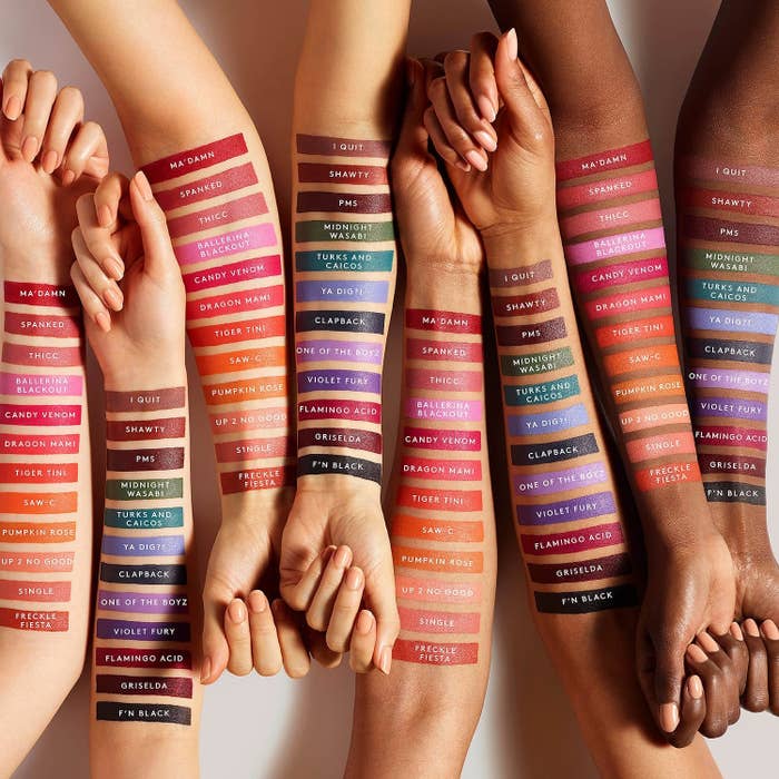 Lipstick swatches in different colors on arms with different skin tones