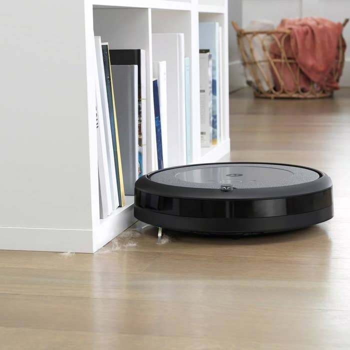 A black iRobot vacuum