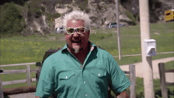 Gif of Guy Fieri punching the air in celebration