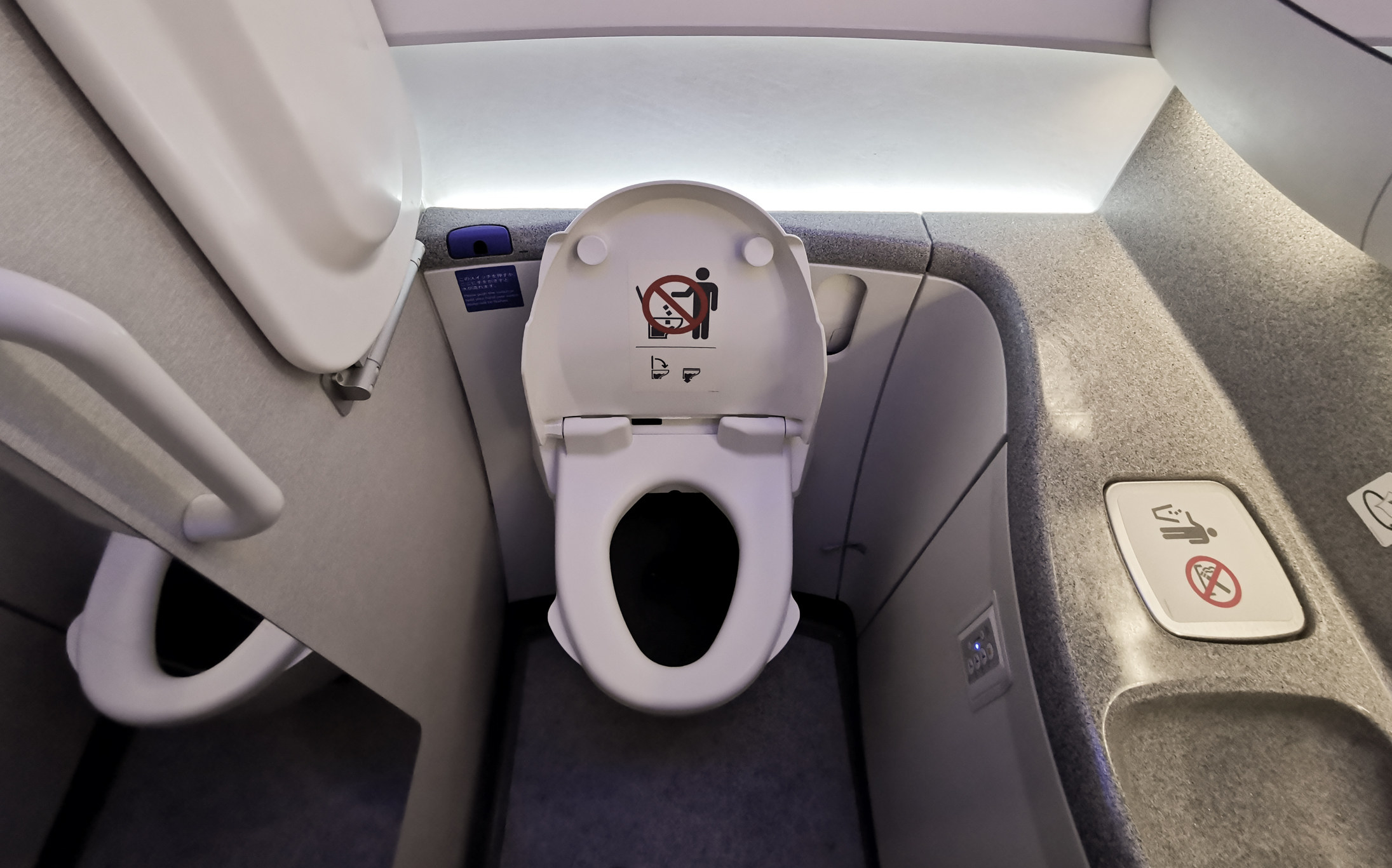 Inside of an airplane lavatory