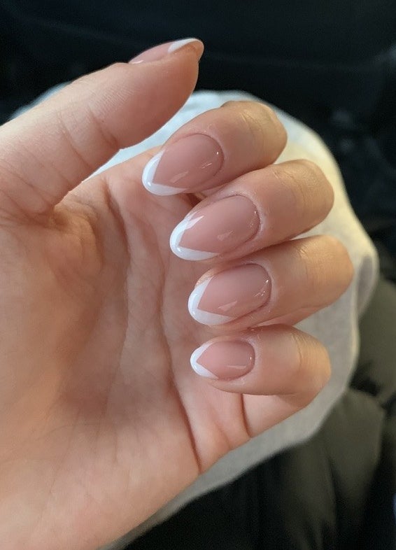 BuzzFeed employee&#x27;s hand showing nails