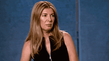 Nina Garcia gives an unimpressed look and blinks on Project Runway