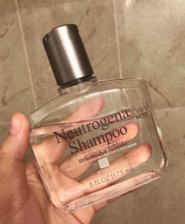 reviewer holding anti-residue formula from Neutrogena
