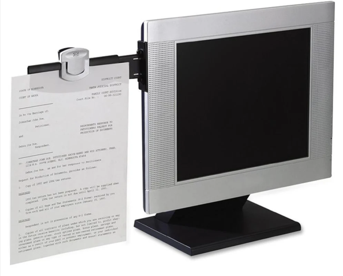 the 3M Monitor-Mount Dual Document Clip attached to a monitor with a document clipped to it