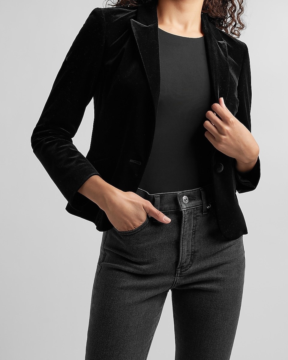 model wearing the black velvet blazer