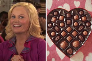 Leslie Knope smiling next to heart-shaped box of chocolates