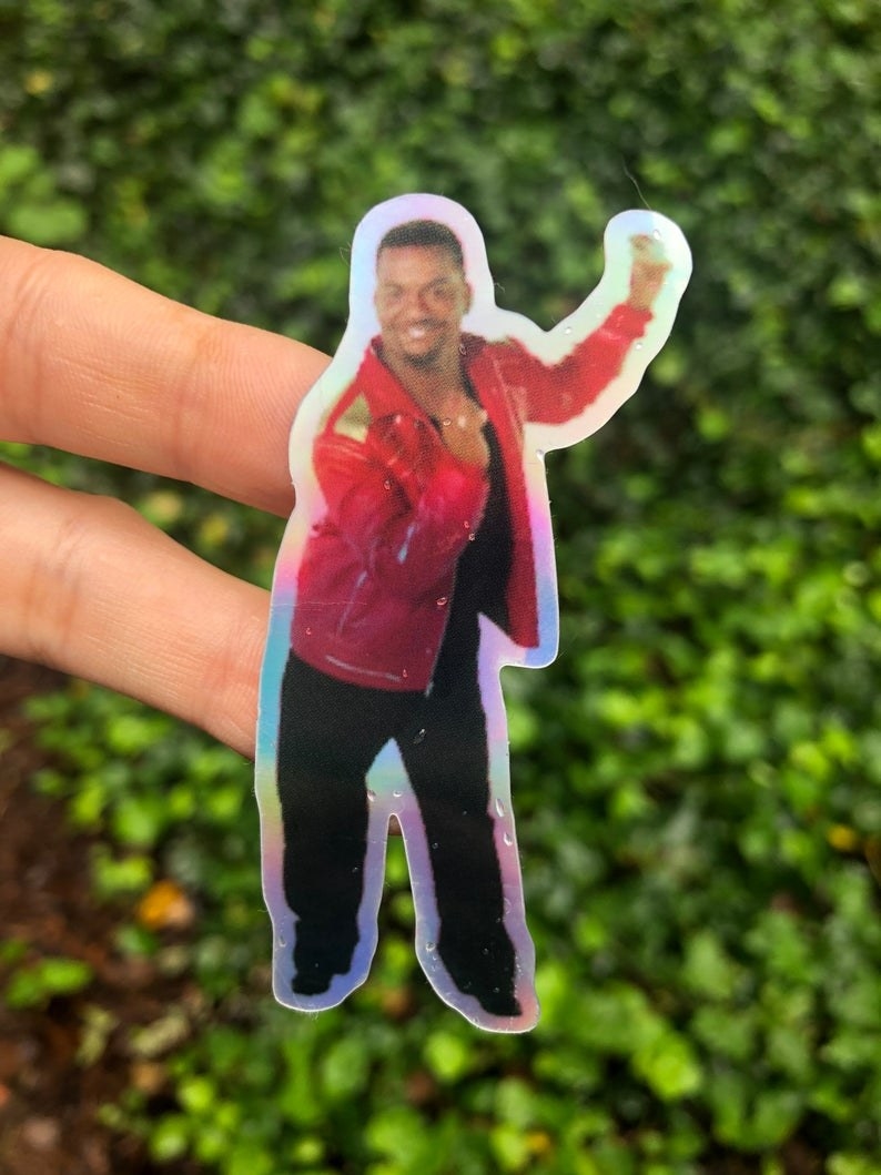 the holographic sticker of Carlton doing his popular dance 